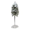 Snowy cedar tree on a wooden block base on white
