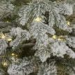 close-up of the snowy branches and LED lights