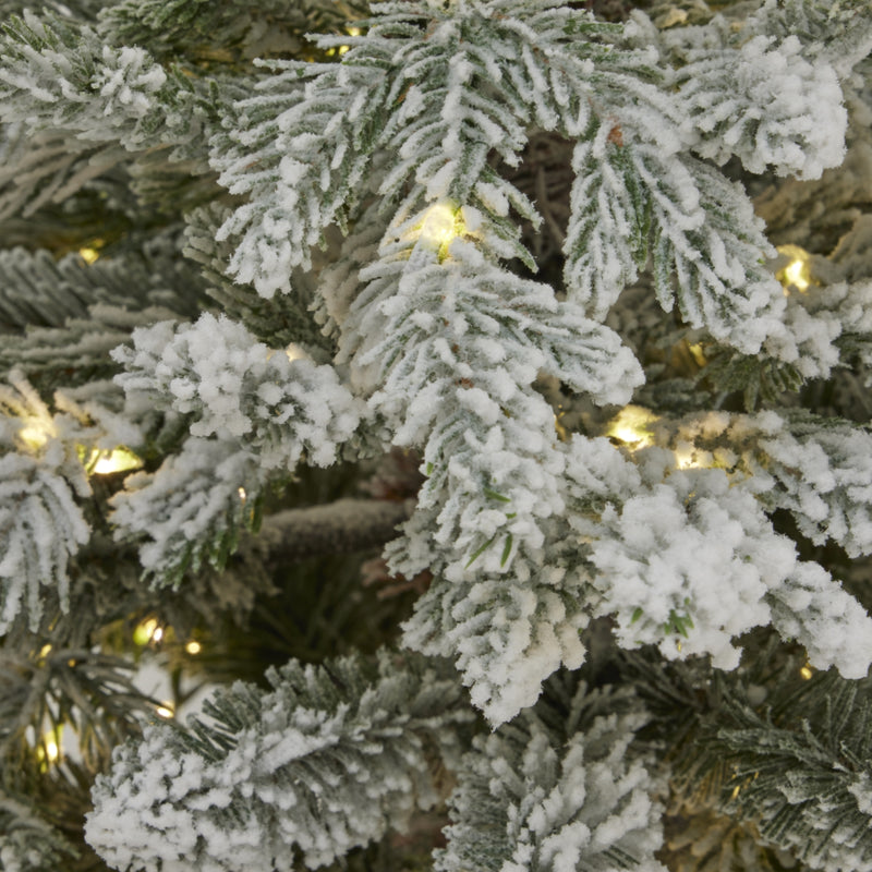 close-up of the snowy branches and LED lights