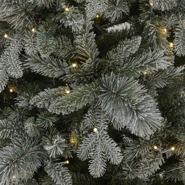 close-up of the snowy branches and LED lights