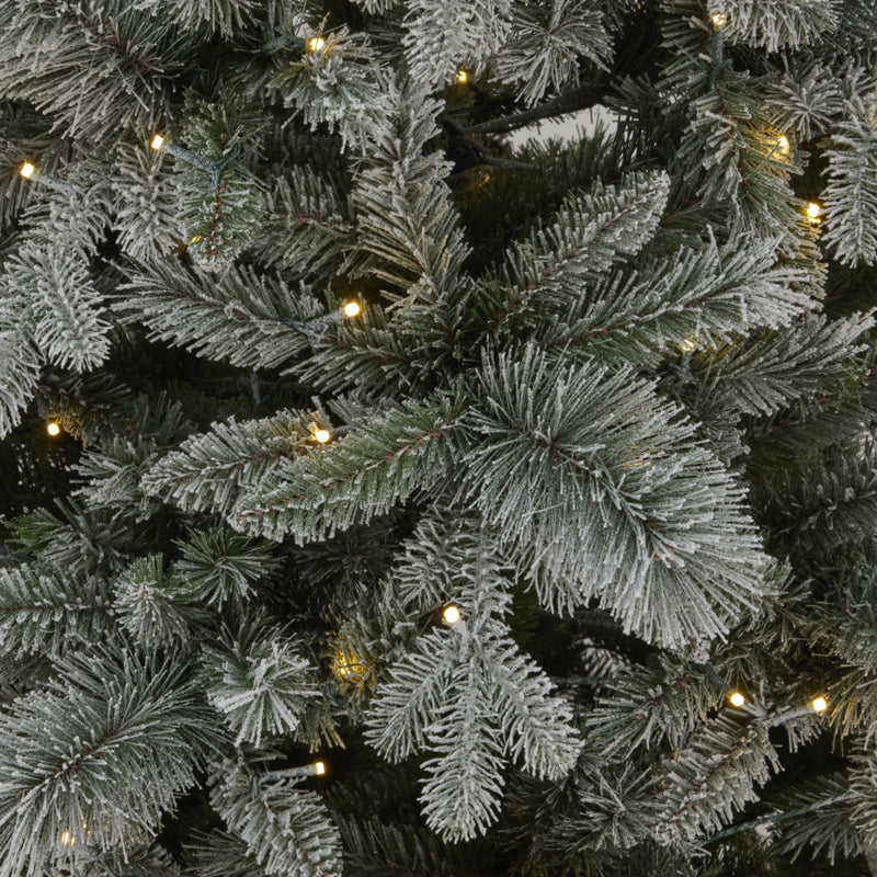 close-up of the snowy branches and LED lights