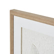 Close-up of the beaded wood-tone frame corner and white border