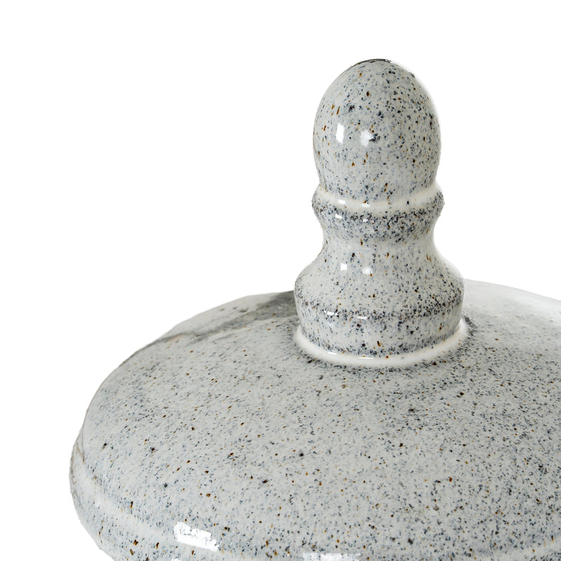 Close-up of the domed ceramic lid and finial
