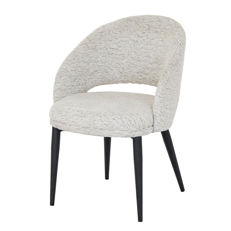 Sorelle curved cream dining chair, three-quarter view