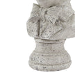Close-up of the bow tie and turned plinth base