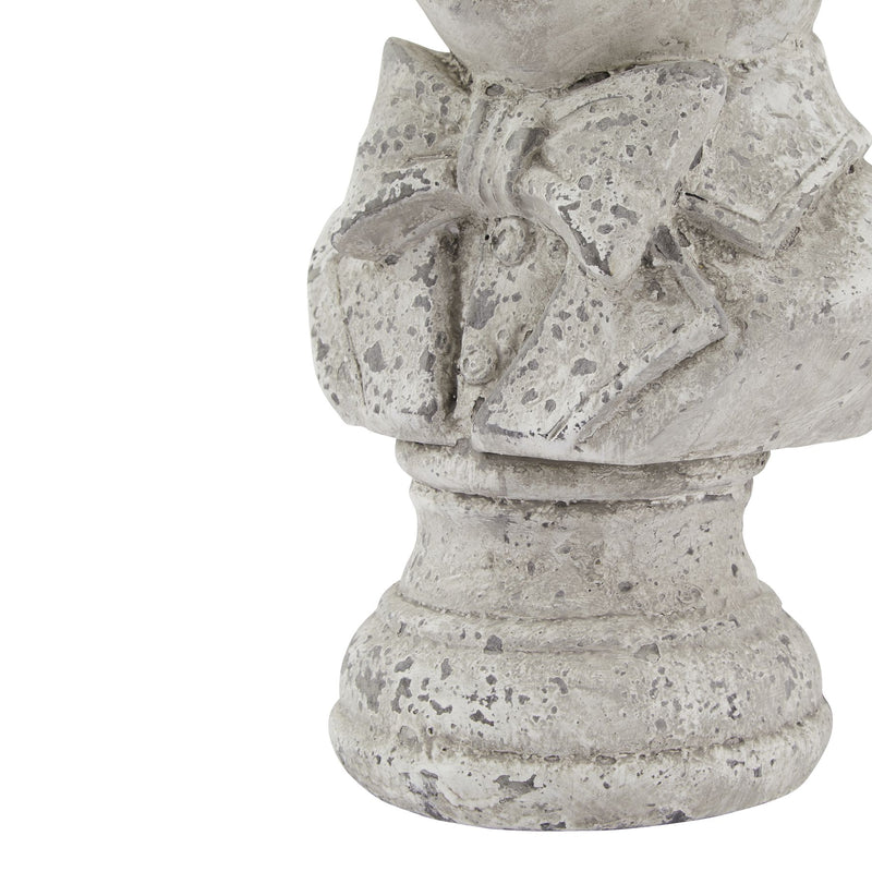 Close-up of the bow tie and turned plinth base