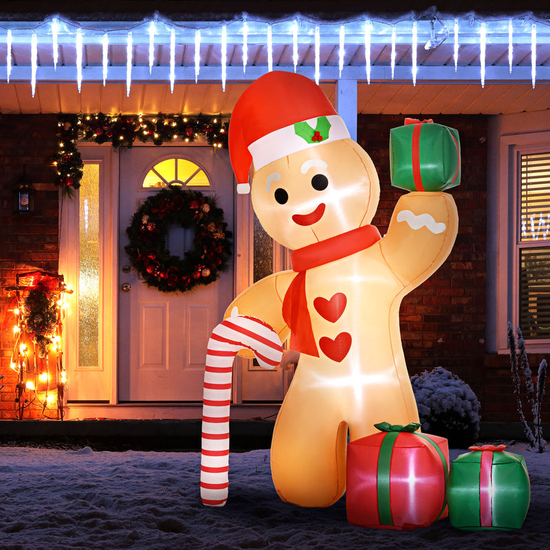 8ft Gingerbread Man Inflatable displayed outside a decorated home