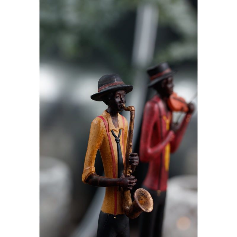 Close-up of the saxophonist with a violinist figure, sold separately