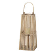 Tapered wicker lantern with a candle in its glass holder