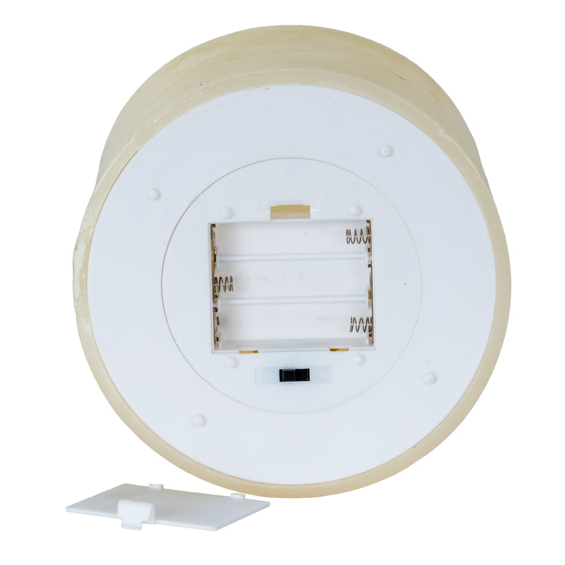Base of the candle showing the battery compartment and switch