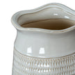 Close-up of the wavy rim and glazed top band