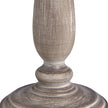 Close-up of the turned whitewashed wooden base
