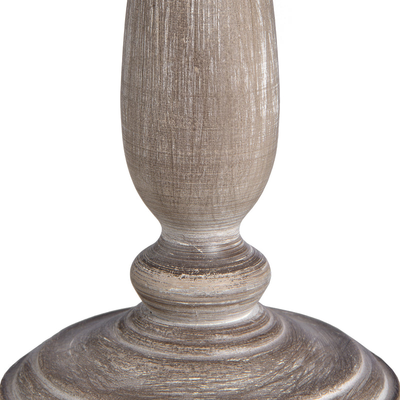 Close-up of the turned whitewashed wooden base