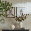 Terran art hung on a panelled wall beside a second abstract artwork sold separately