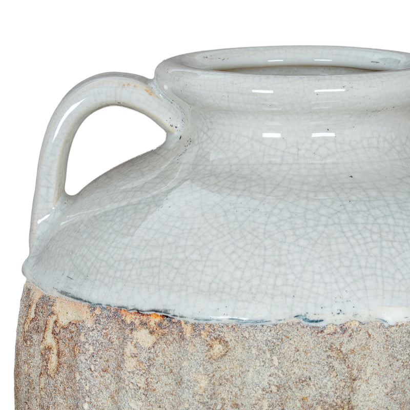 Close-up where the glaze meets the stone-effect base