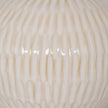 Close-up of the carved vertical texture