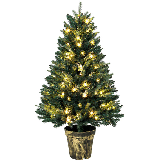 4ft dense pre-lit green fir Christmas tree with warm white LEDs in a decorative pot