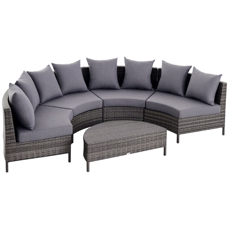 Grey half-round rattan sofa set with four curved seats, throw pillows and coffee table