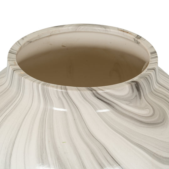 Looking into the marble effect planter's wide opening