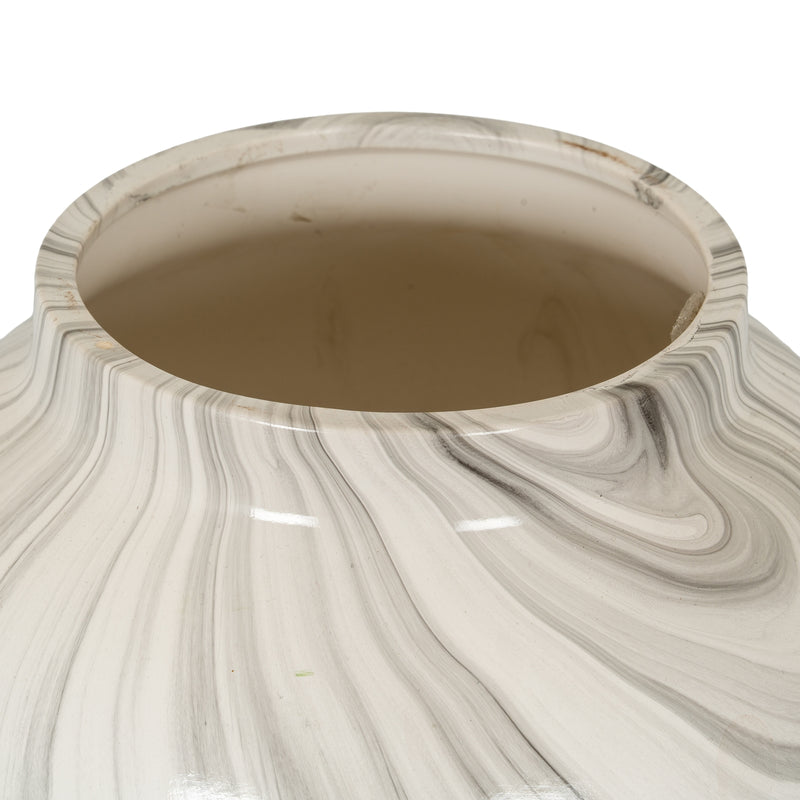 Looking into the marble effect planter's wide opening