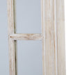 Close-up of a pane divider on the washed wood frame
