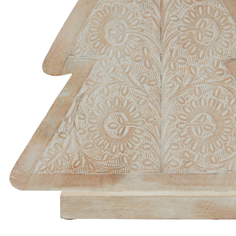 Close-up of the raised floral pattern and block base