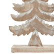 Close-up of the carved tiers, trunk and base