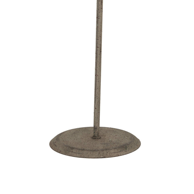 Round metal base and rod of the tree stand