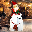 6.6ft Santa on Polar Bear Christmas Inflatable displayed outside a decorated home