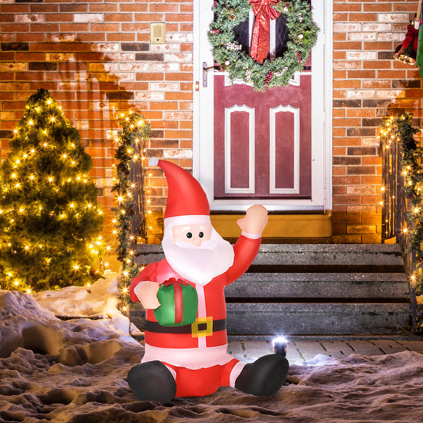 4ft Sitting Santa displayed outside a decorated home