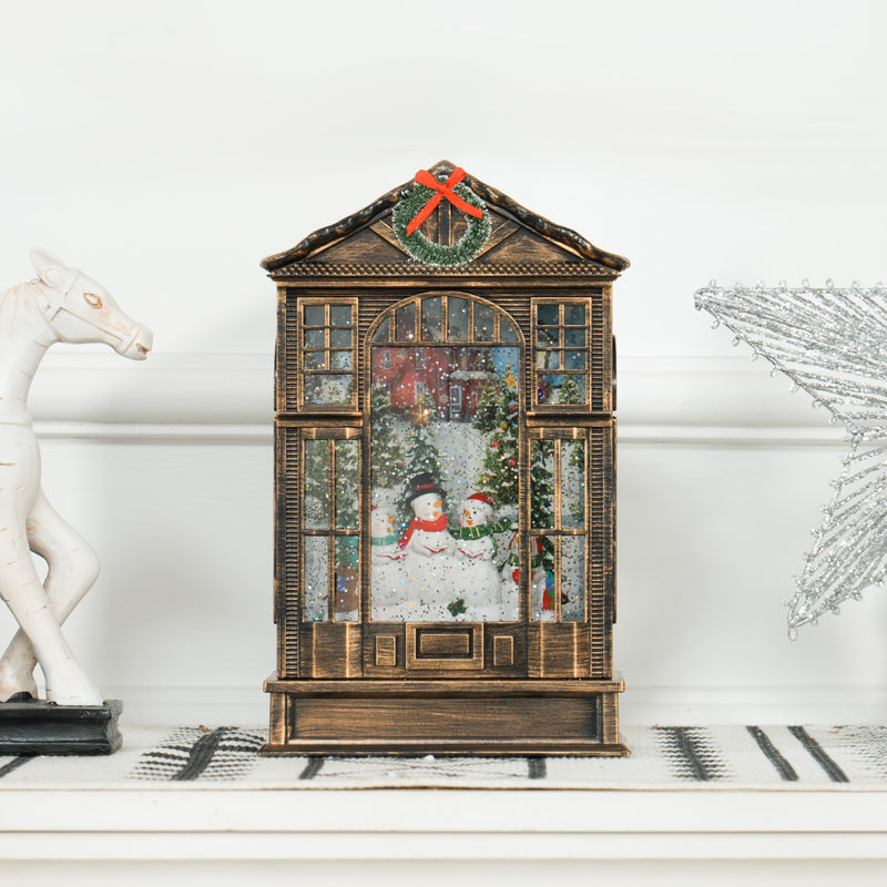 Lit snow globe lantern with swirling glitter