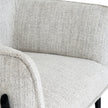 close-up of the curved arm and textured fabric