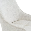 Close-up of the flecked off-white fabric and curved back