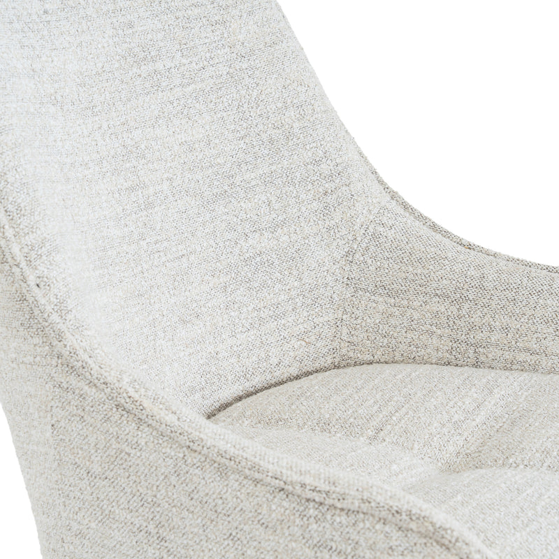 Close-up of the flecked off-white fabric and curved back